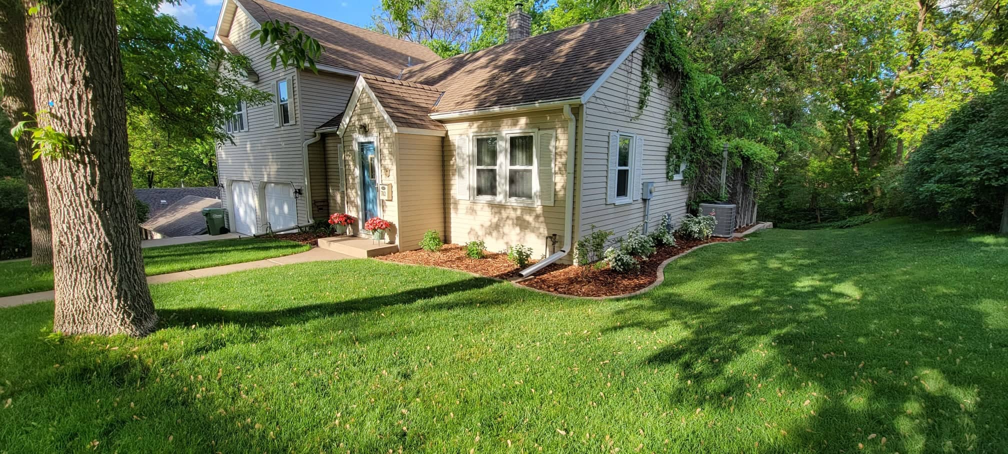 residential home with mowed lawn